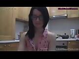 splendid teen with glasses chatting in the kitchen