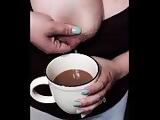 Lactating big tit mom squeezes breast milk into coffee